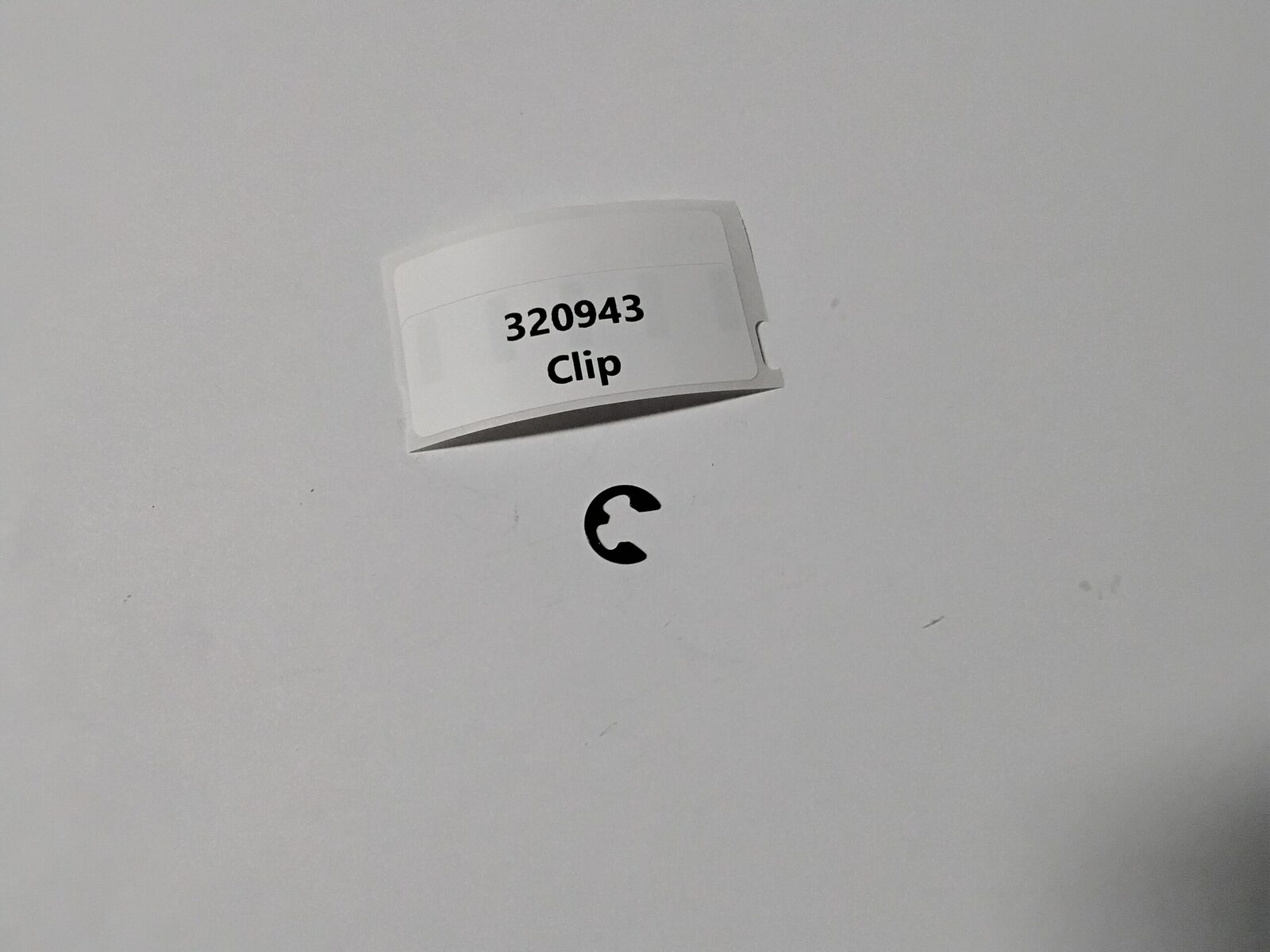 320943